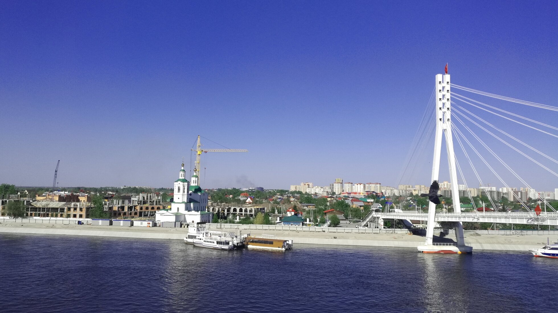 Вознесенско-Георгиевская церковь и Мост Влюбленных в Тюмени