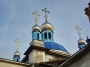 Успенская церковь в Новоуткинске: купола и кресты